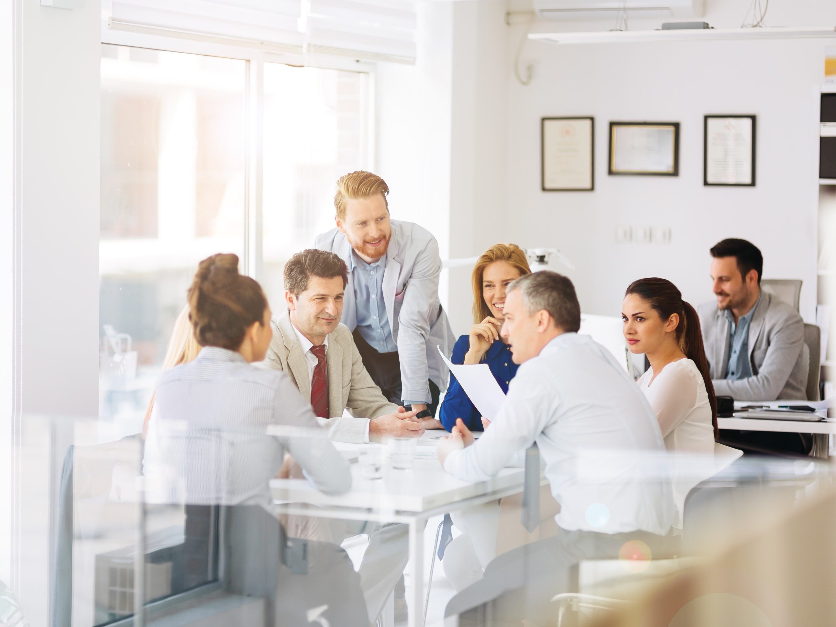 Businesspeople and architects planning for the future