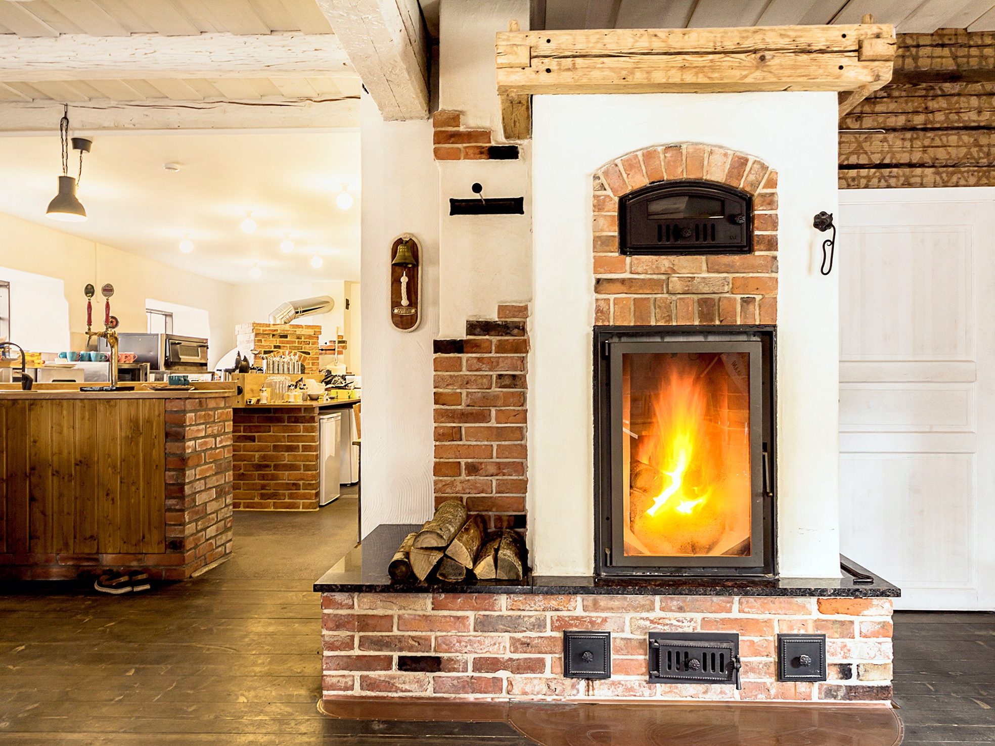 Fireplace is built with old bricks and its inner part with Aseri produced PTT65 Light Red Smooth bricks.