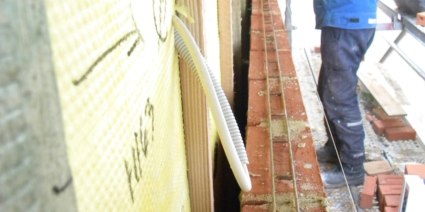 Building process of brick facade - bricks installation