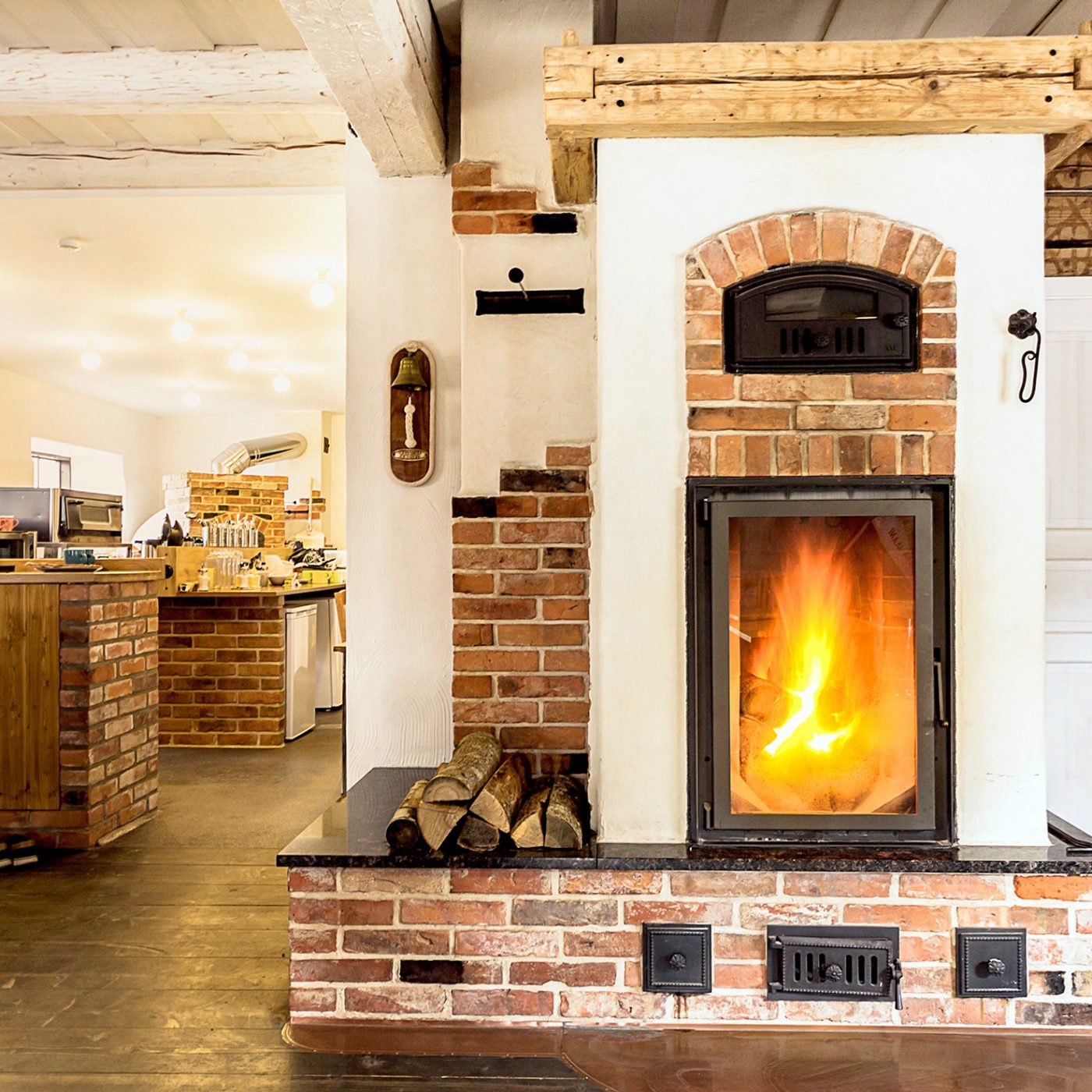 Fireplace is built with old bricks and its inner part with Aseri produced PTT65 Light Red Smooth bricks.