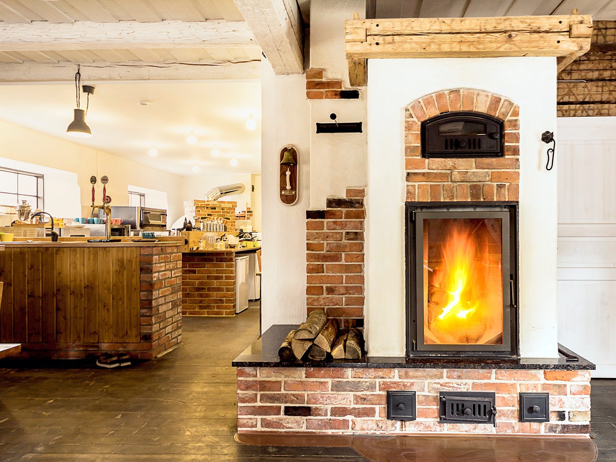 Fireplace is built with old bricks and its inner part with Aseri produced PTT65 Light Red Smooth bricks.