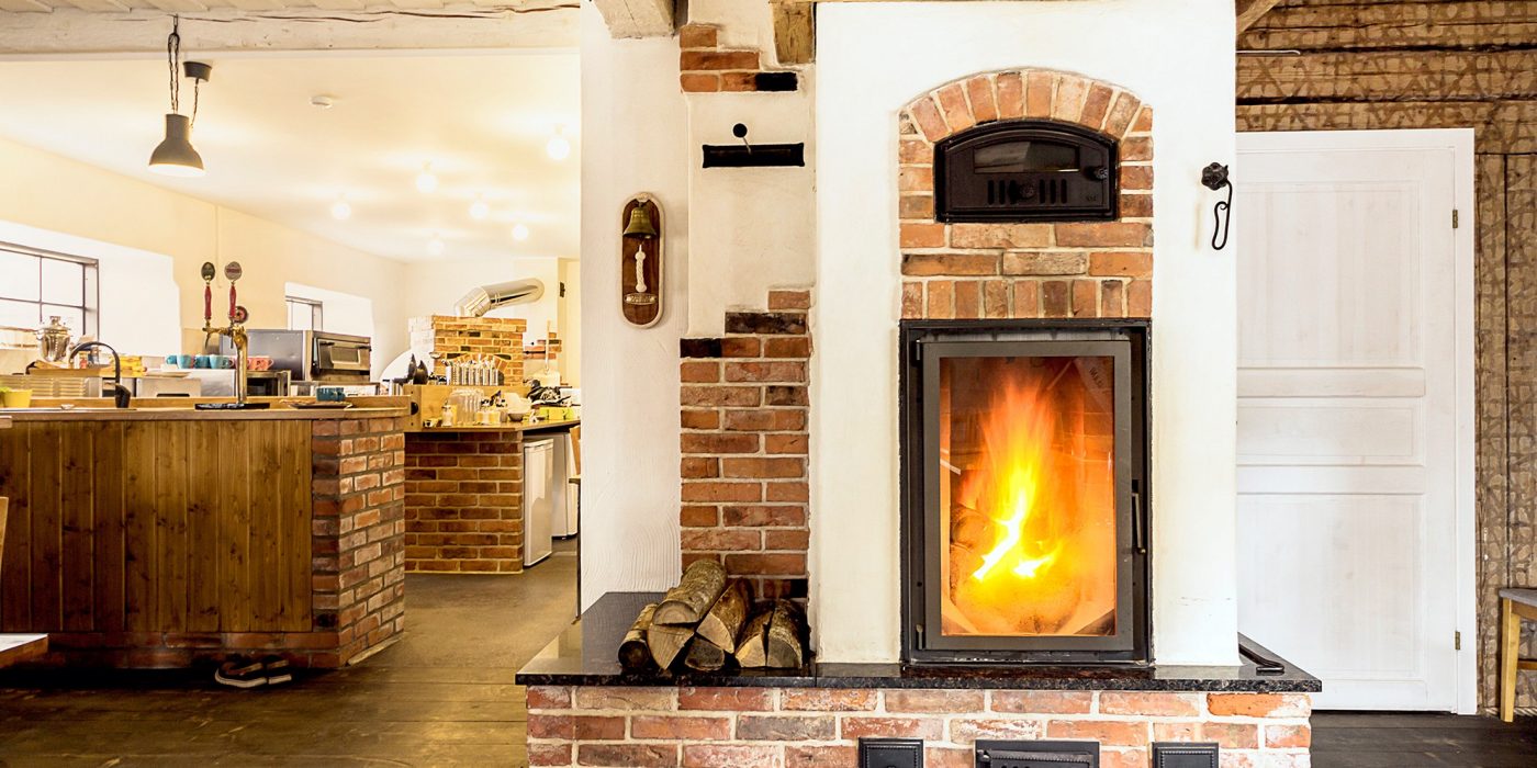Fireplace is built with old bricks and its inner part with Aseri produced PTT65 Light Red Smooth bricks.