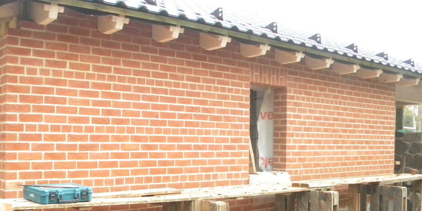 Building process of brick facade - bricks installation