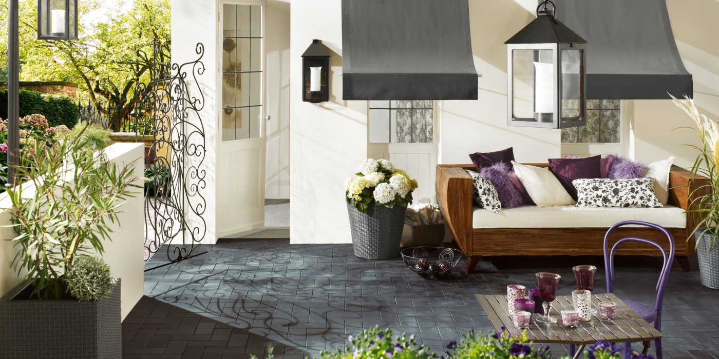 Terrace with Penter Dresden, Flowers, sofa, white wall, art