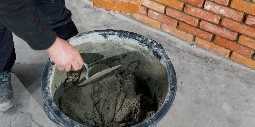 Installing bricks with traditional mortar