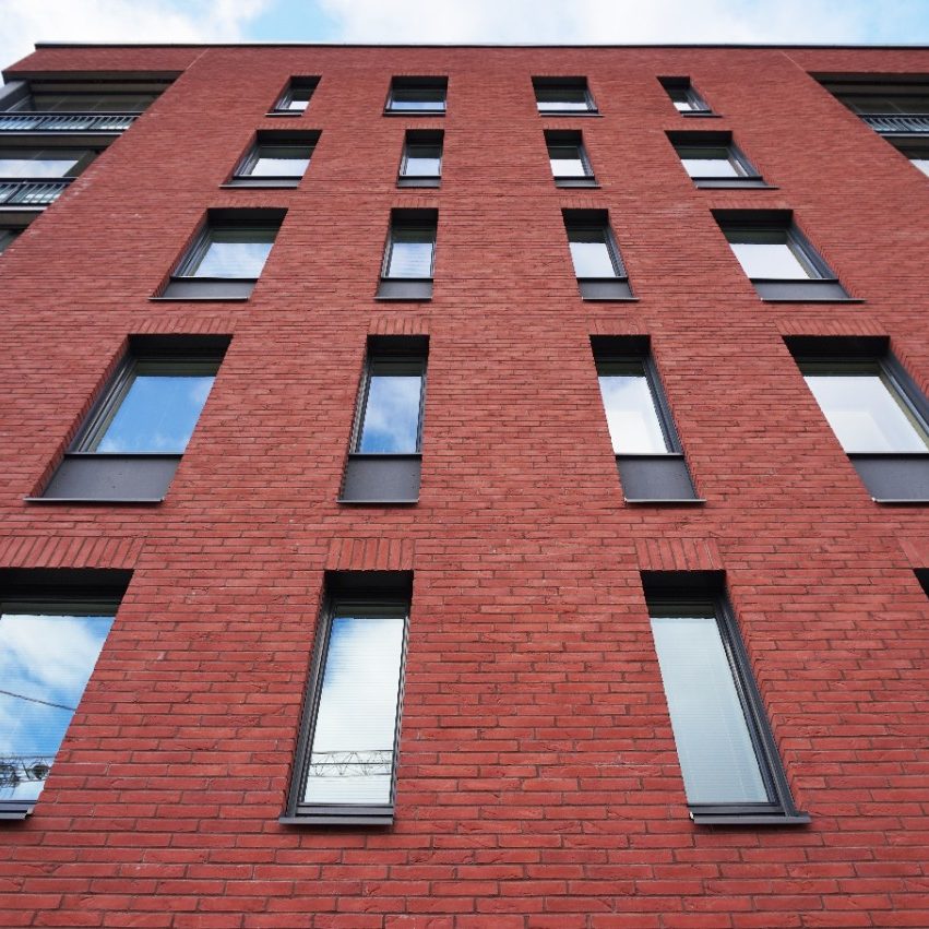 Apartment building Kivisto Vantaa  with red Iltarusko brick facade